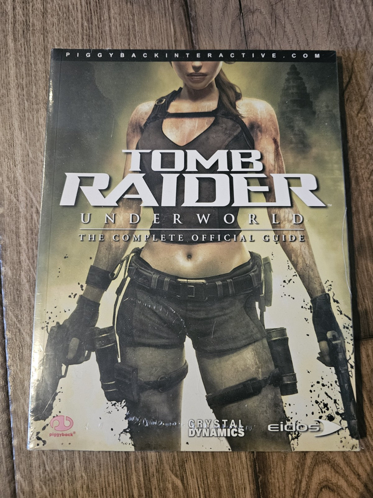Tomb Raider Underworld The Complete Official Guide by Piggyback Maura Sutton New