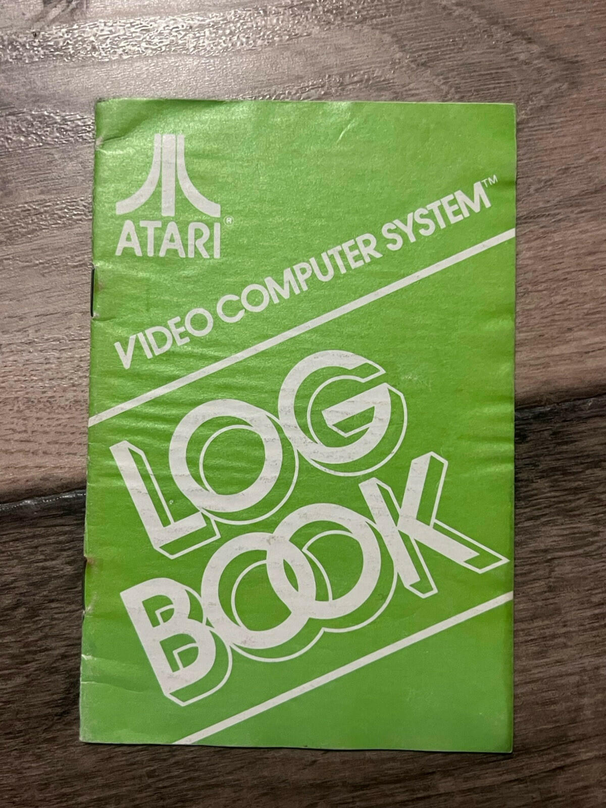Atari 2600 Green Log Book Mail-In Version UNUSED