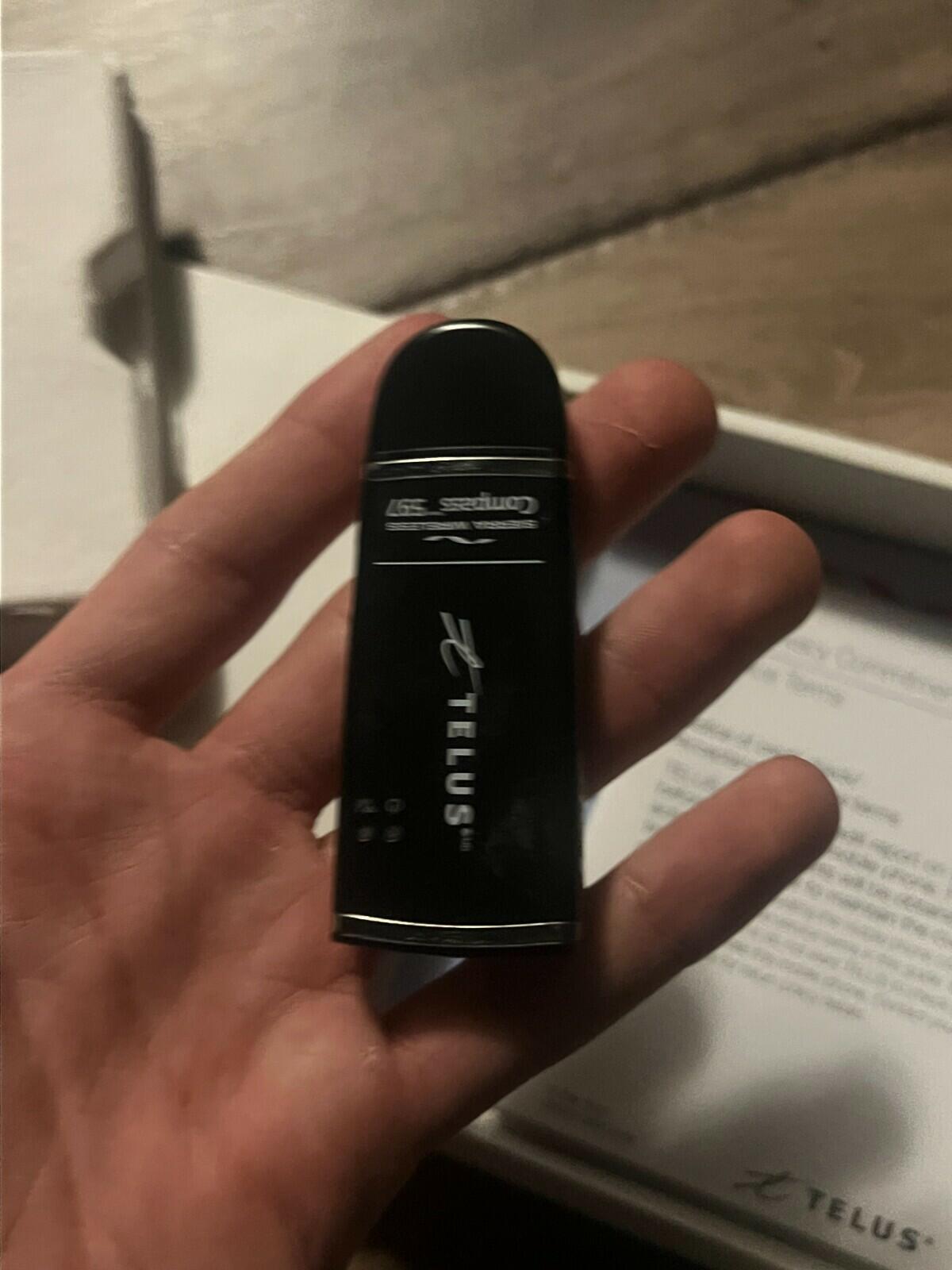 Sierra Wireless Compass 597 Telus USB Modem w/ 7" USB Cable, Pouch, And Box