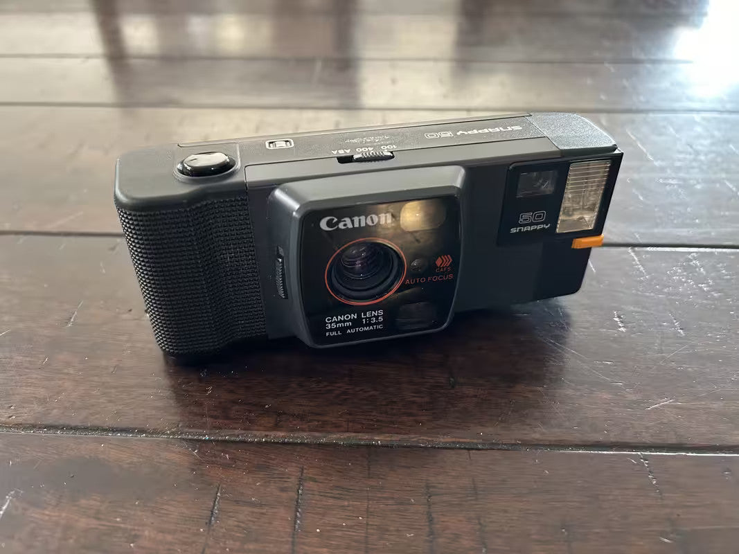Canon Snappy 50 Auto Focus Full Automatic 35mm Camera flash doesn't work